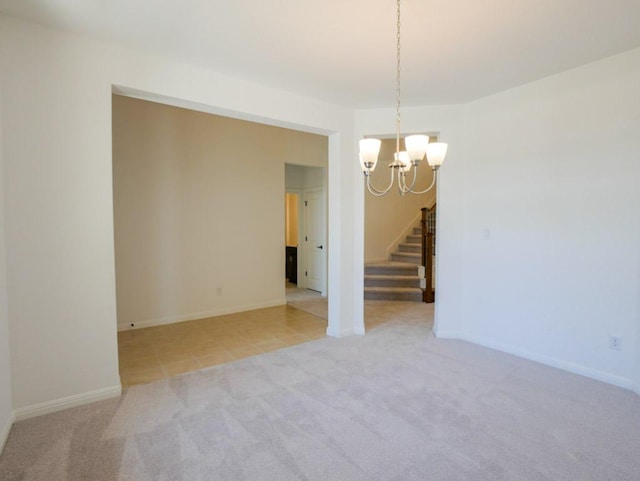 1709 Cayuga St, Leander, TX 78641 - unfurnished room with a chandelier, light carpet, stairway, and baseboards