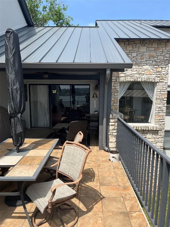 103 Island Dr Unit 8, Horseshoe Bay, TX 78657 - view of patio featuring outdoor dining space