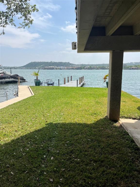 103 Island Dr Unit 8, Horseshoe Bay, TX 78657 - view of green lawn featuring a water view