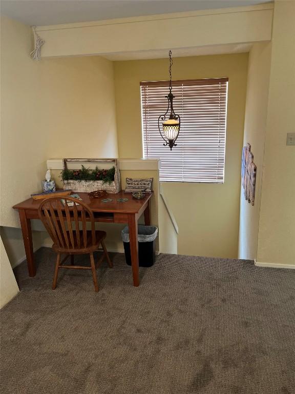 103 Island Dr Unit 8, Horseshoe Bay, TX 78657 - dining room with carpet flooring