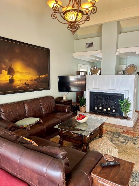 103 Island Dr Unit 8, Horseshoe Bay, TX 78657 - living room featuring a fireplace with raised hearth