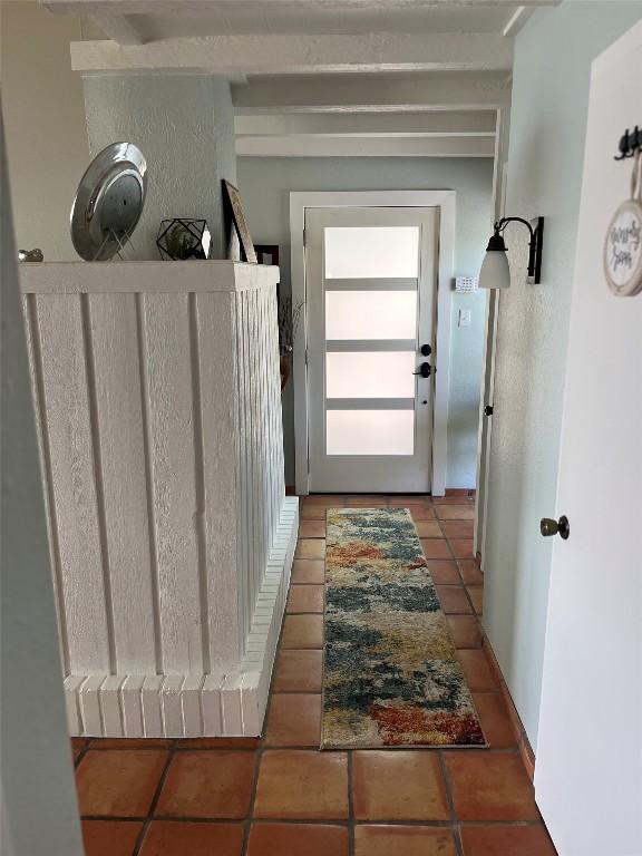 103 Island Dr Unit 8, Horseshoe Bay, TX 78657 - doorway to outside featuring tile patterned flooring