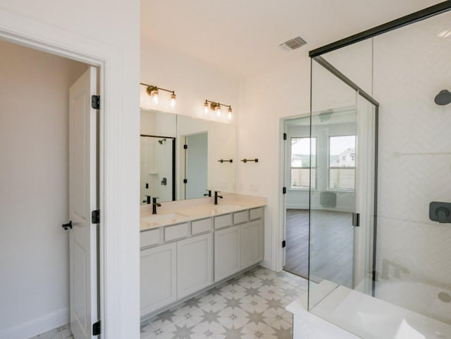 2916 Carrizo Ter, Leander, TX 78641 - full bath featuring tile patterned floors and double vanity