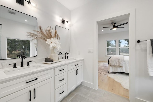 TBD Rust Ranch Rd, Blanco, TX 78606 - bathroom with ensuite bathroom, a ceiling fan, double vanity, baseboards, and recessed lighting