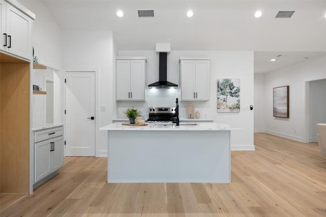 TBD Rust Ranch Rd, Blanco, TX 78606 - kitchen featuring wall chimney exhaust hood, stainless steel electric range, light wood-style flooring, baseboards, and recessed lighting