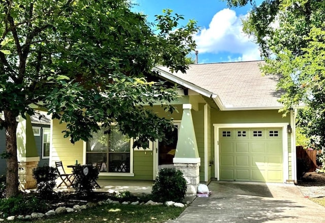 2408 Amur Dr, Austin, TX 78745 - craftsman house with driveway, a garage, and roof with shingles
