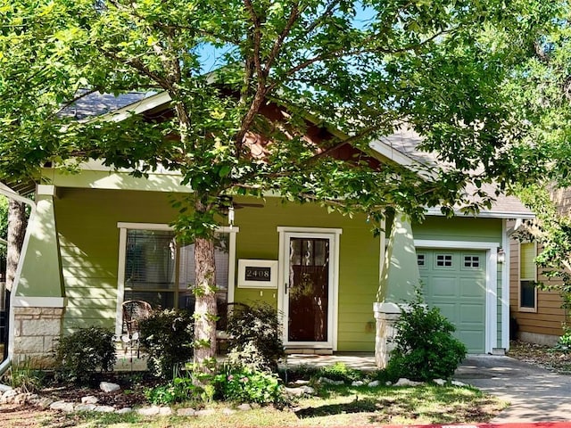 2408 Amur Dr, Austin, TX 78745 - craftsman house with asphalt driveway and an attached garage