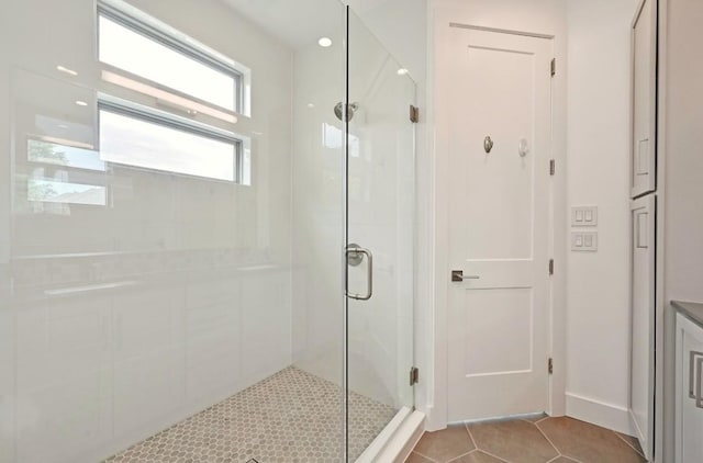 2305 E 16th St Unit A, Austin, TX 78702 - full bath featuring a stall shower and tile patterned floors
