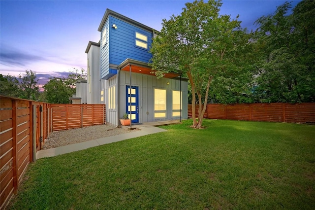 2305 E 16th St Unit A, Austin, TX 78702 - rear view of property featuring board and batten siding