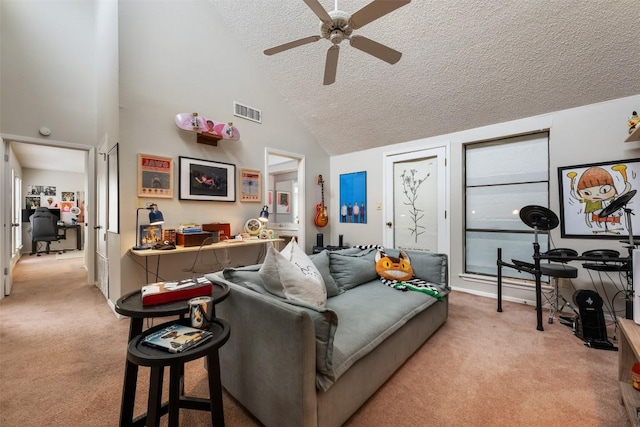 living room with light colored carpet, a ceiling fan, high vaulted ceiling, and a textured ceiling
