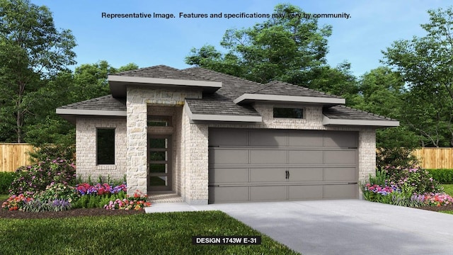 prairie-style home featuring fence, an attached garage, brick siding, and concrete driveway