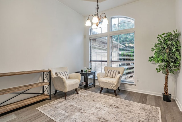 6419 Ira Ingram Dr, Austin, TX 78749 - living area with a chandelier and wood finished floors