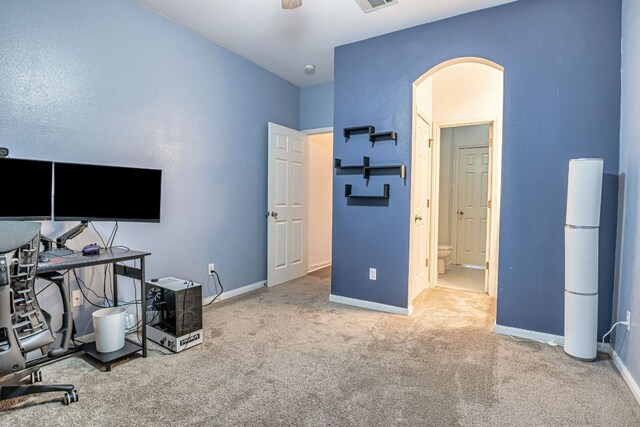 6419 Ira Ingram Dr, Austin, TX 78749 - carpeted office space featuring arched walkways and baseboards