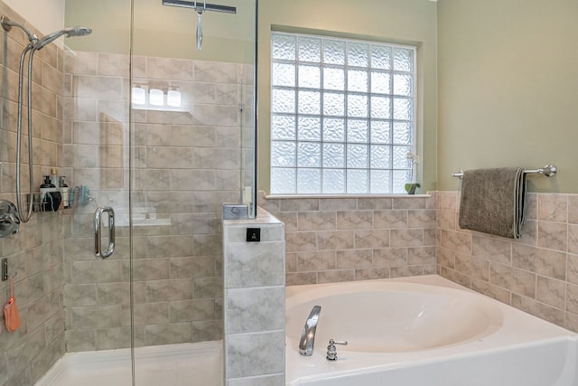 6419 Ira Ingram Dr, Austin, TX 78749 - full bathroom featuring plenty of natural light, a garden tub, and a stall shower