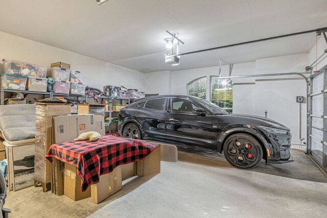 6419 Ira Ingram Dr, Austin, TX 78749 - garage with a garage door opener