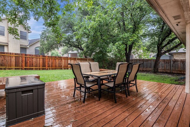 6419 Ira Ingram Dr, Austin, TX 78749 - wooden deck featuring a fenced backyard and outdoor dining area