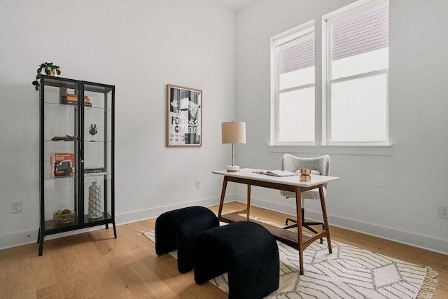 6116 Toscana Ave, Austin, TX 78724 - home office featuring wood finished floors and baseboards