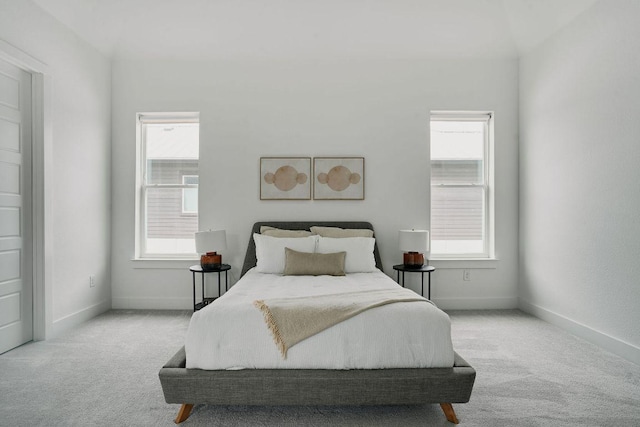 6116 Toscana Ave, Austin, TX 78724 - carpeted bedroom with multiple windows and baseboards