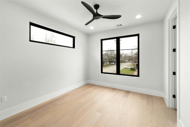 1719 Piedmont Ave, Austin, TX 78757 - spare room featuring plenty of natural light, light wood-style floors, recessed lighting, and ceiling fan