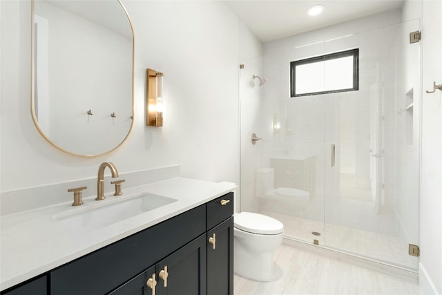 1719 Piedmont Ave, Austin, TX 78757 - bathroom with toilet, a stall shower, and vanity