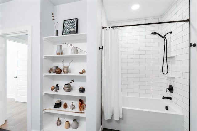 3101 Govalle Ave Unit 114, Austin, TX 78702 - bathroom featuring shower / bathtub combination with curtain, built in shelves, and recessed lighting