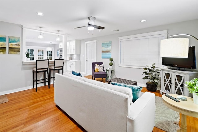 5614 Shoalwood Ave, Austin, TX 78756 - living area with light wood-style flooring, a ceiling fan, baseboards, and recessed lighting