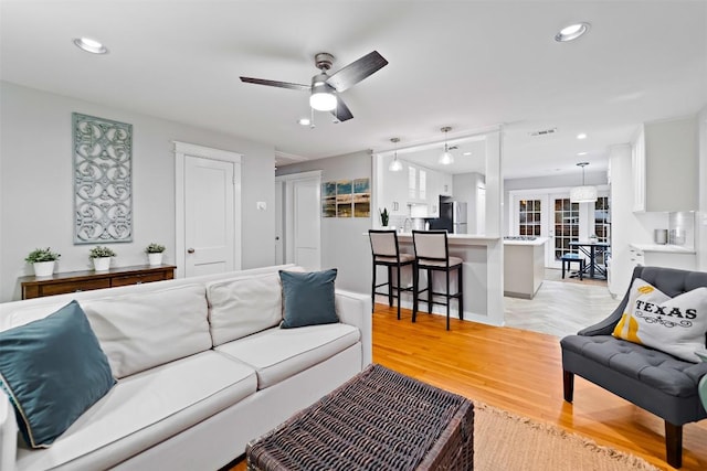 5614 Shoalwood Ave, Austin, TX 78756 - living room featuring recessed lighting, light wood-type flooring, and a ceiling fan