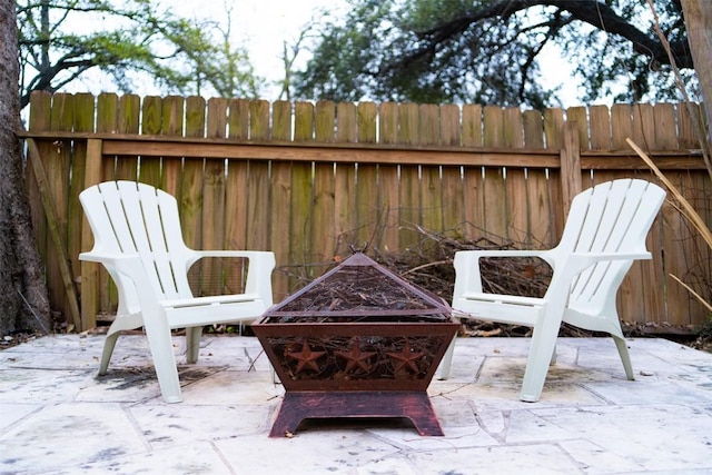 5614 Shoalwood Ave, Austin, TX 78756 - view of patio with a fire pit and fence
