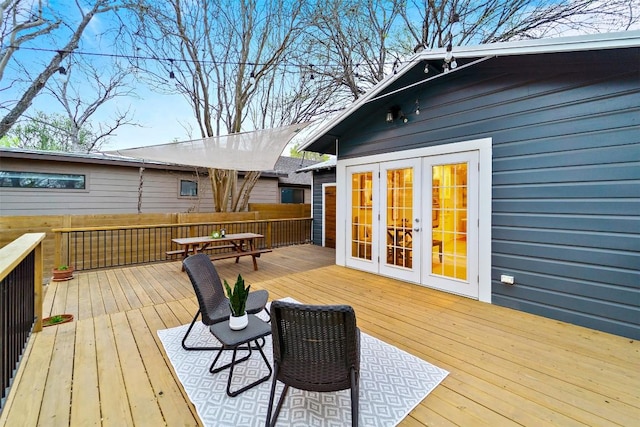 5614 Shoalwood Ave, Austin, TX 78756 - wooden deck featuring outdoor dining space and french doors
