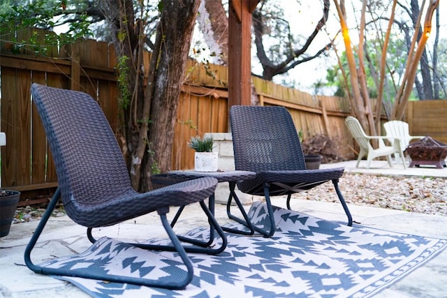 5614 Shoalwood Ave, Austin, TX 78756 - view of patio / terrace with fence and a fire pit