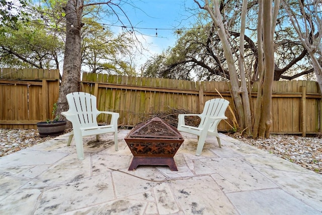 5614 Shoalwood Ave, Austin, TX 78756 - view of patio / terrace with fence and an outdoor fire pit
