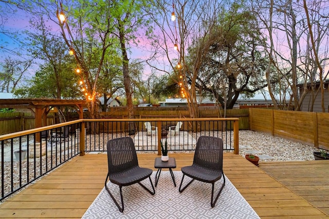 5614 Shoalwood Ave, Austin, TX 78756 - deck at dusk featuring a fenced backyard