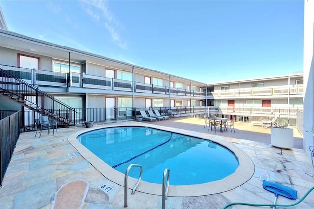 3110 Red River St Unit C-402, Austin, TX 78705 - community pool featuring fence and a patio