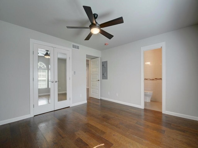 3110 Red River St Unit C-402, Austin, TX 78705 - unfurnished bedroom featuring french doors, wood finished floors, and baseboards