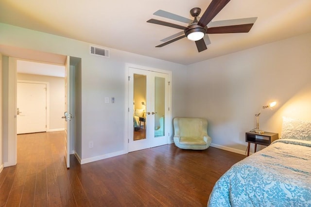 3110 Red River St Unit C-402, Austin, TX 78705 - bedroom featuring french doors, wood finished floors, baseboards, and ceiling fan