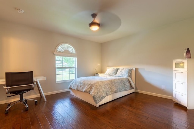 3110 Red River St Unit C-402, Austin, TX 78705 - bedroom with dark wood-style floors, baseboards, a desk, and ceiling fan