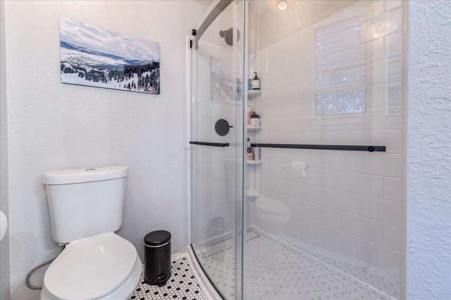 12005 Thompkins Dr, Austin, TX 78753 - bathroom with a stall shower, a textured wall, and tile patterned flooring
