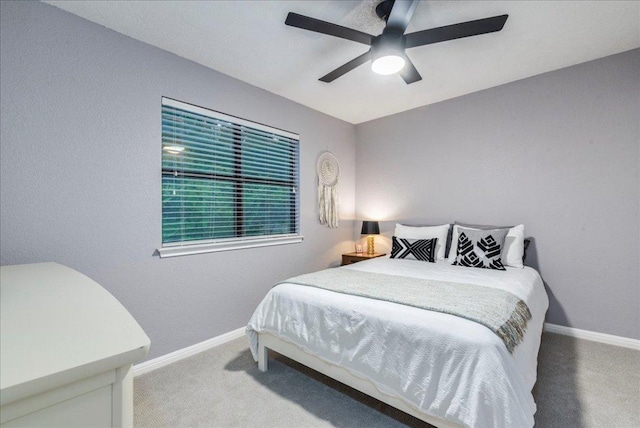 12005 Thompkins Dr, Austin, TX 78753 - carpeted bedroom featuring baseboards and ceiling fan