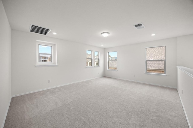 3747 Liberi Ln, Round Rock, TX 78665 - empty room with light carpet, healthy amount of natural light, and recessed lighting