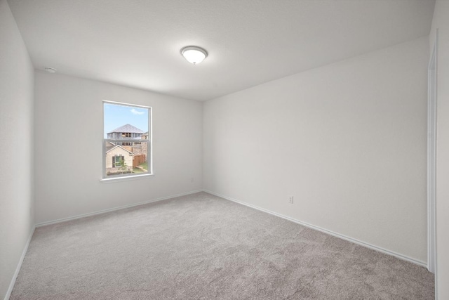 3747 Liberi Ln, Round Rock, TX 78665 - carpeted spare room featuring baseboards