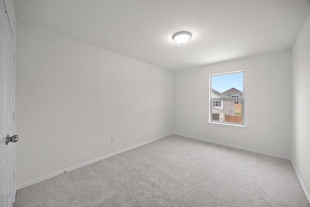 3747 Liberi Ln, Round Rock, TX 78665 - carpeted spare room with baseboards