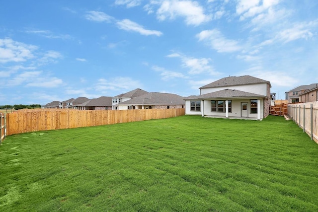 3747 Liberi Ln, Round Rock, TX 78665 - rear view of house with a fenced backyard and a residential view
