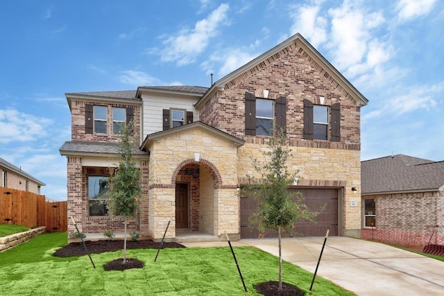 3747 Liberi Ln, Round Rock, TX 78665 - view of front facade featuring driveway, a garage, and brick siding