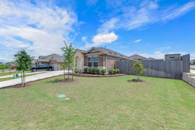 3201 Dusted Daisey St, Pflugerville, TX 78660 - single story home featuring concrete driveway, brick siding, and an attached garage