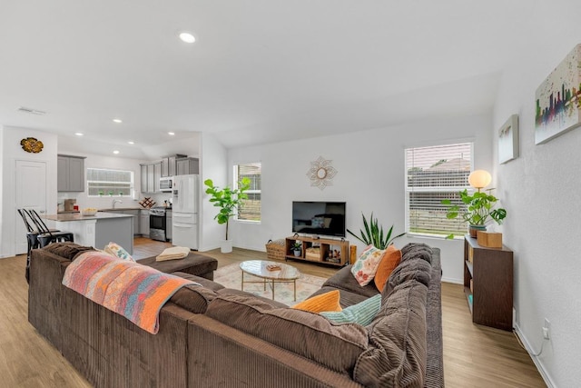 3201 Dusted Daisey St, Pflugerville, TX 78660 - living area featuring light wood-style floors and recessed lighting