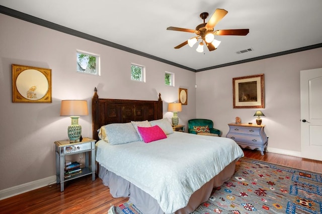 1907 Winsted Ln Unit 1, Austin, TX 78703 - bedroom with baseboards, wood finished floors, crown molding, and a ceiling fan