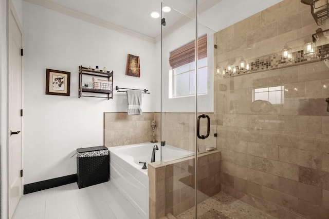 1907 Winsted Ln Unit 1, Austin, TX 78703 - full bathroom with a bath, a stall shower, ornamental molding, and tile patterned floors