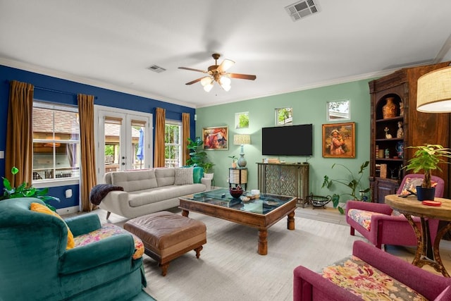 1907 Winsted Ln Unit 1, Austin, TX 78703 - living room featuring a ceiling fan, ornamental molding, and wood finished floors