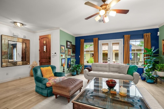 1907 Winsted Ln Unit 1, Austin, TX 78703 - living area with healthy amount of natural light, light wood finished floors, ceiling fan, baseboards, and ornamental molding