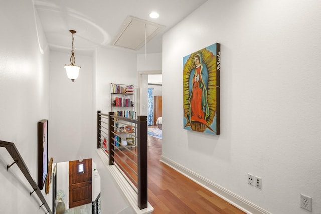 1907 Winsted Ln Unit 1, Austin, TX 78703 - stairs featuring attic access, wood finished floors, baseboards, and recessed lighting